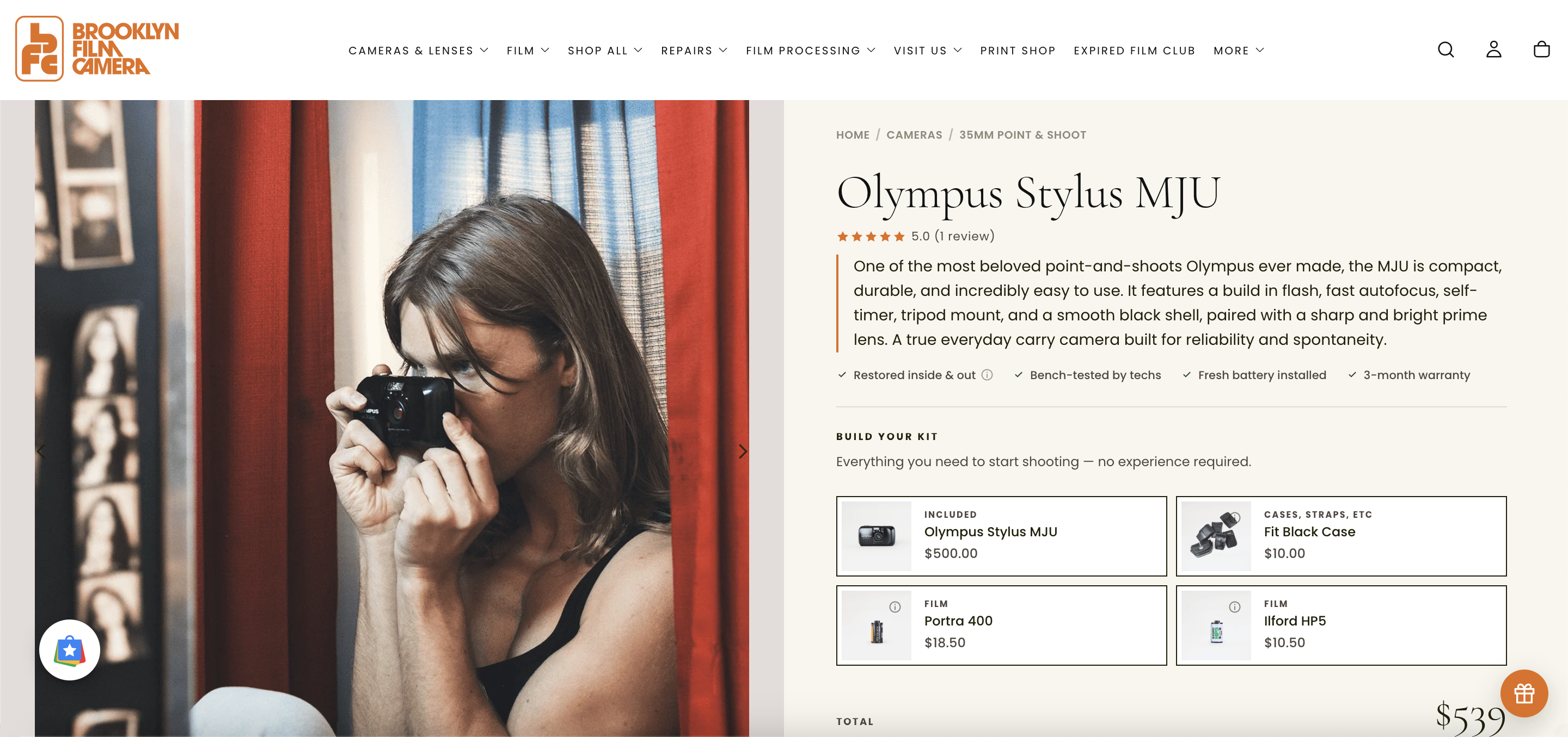 Brooklyn Film Camera Olympus Stylus MJU product page featuring a person taking a photograph