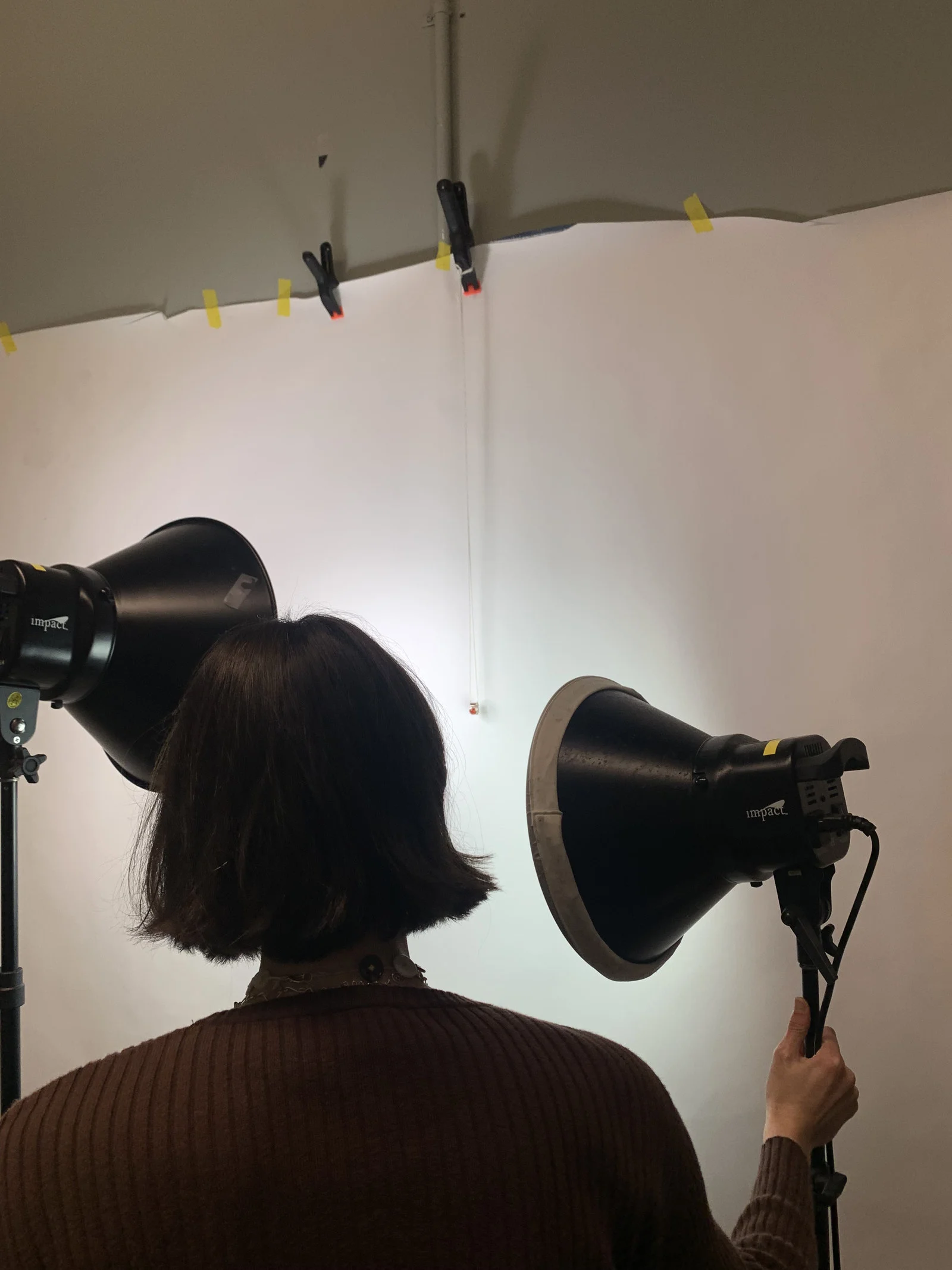 Adjusting the studio lighting