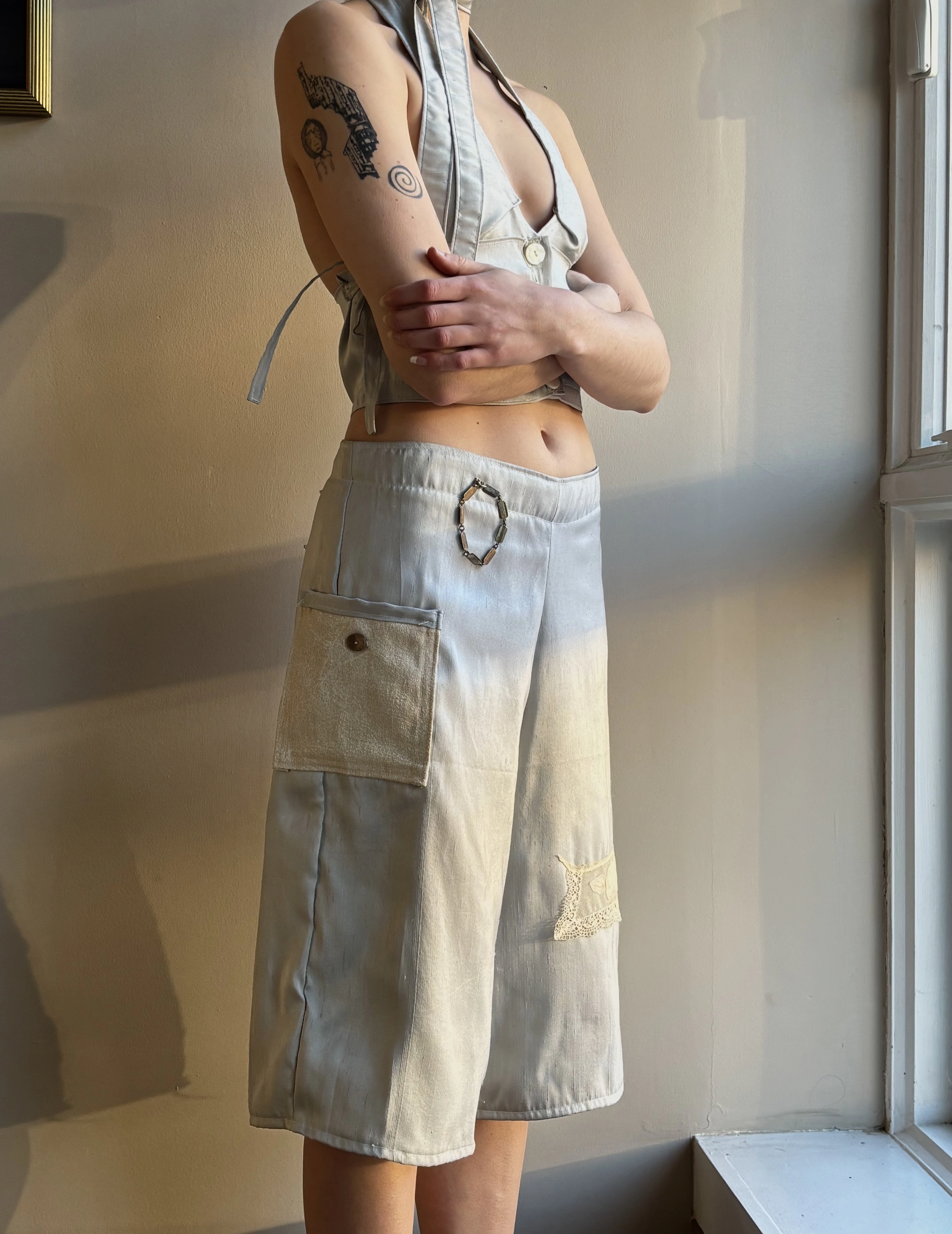 A handmade fitted top and patchwork skirt